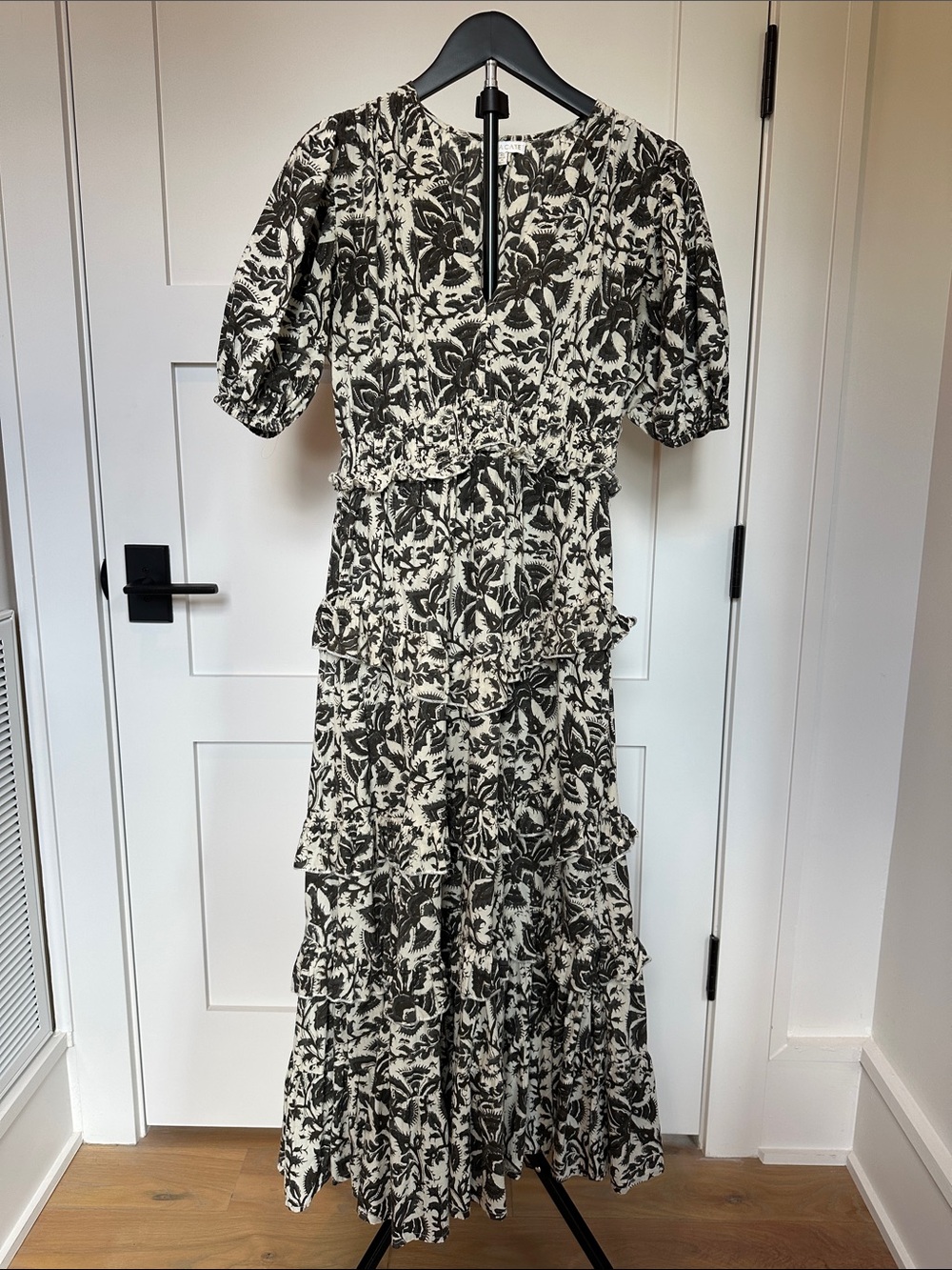 Anna Cate dress with full tiered skirt and a full shoulder